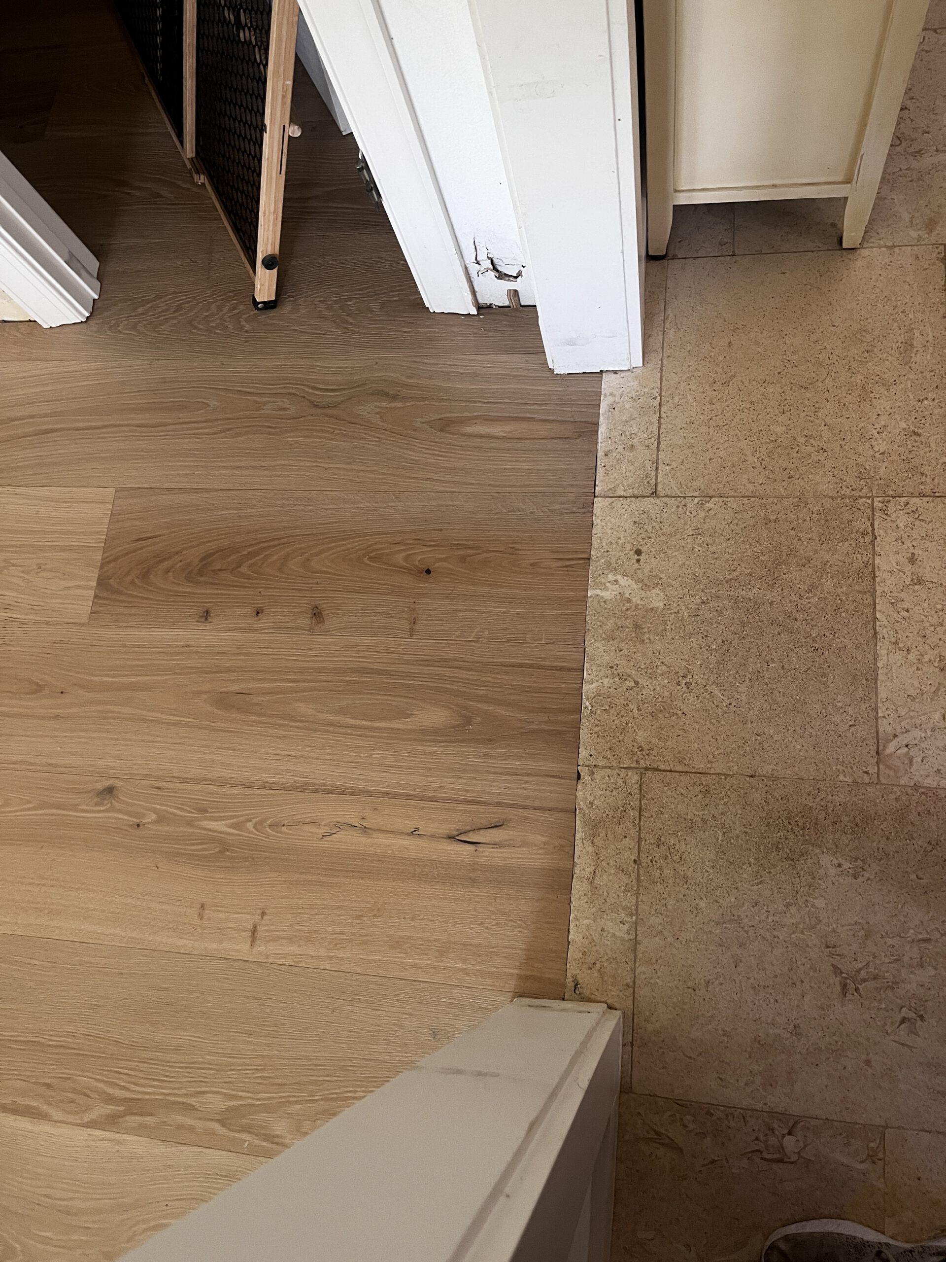 Hardwood–tile flush seam — Venice